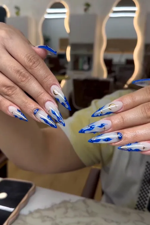 Hand-painted nail art done at the salon's nail bar